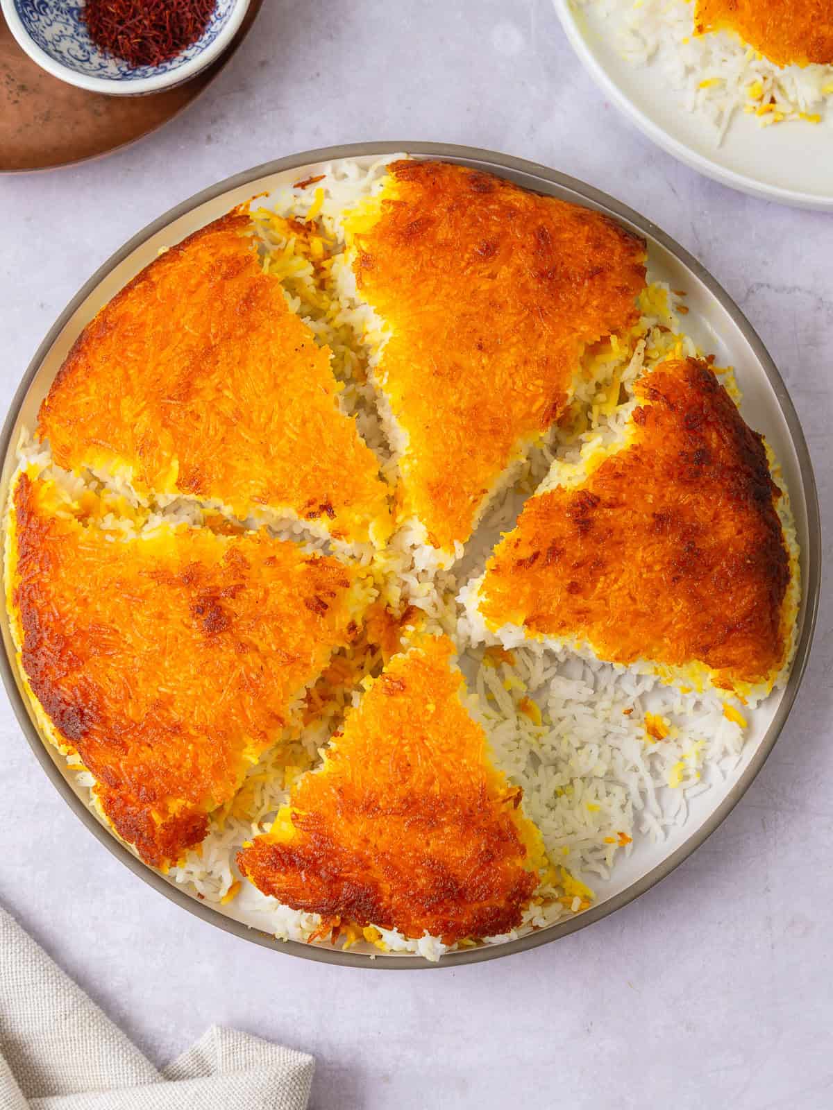 Persian rice recipe with tahdig is amde with fragrant basmati rice and a crispy saffron rice layer called tah-dig.