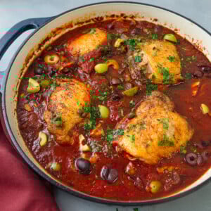 This easy chicken puttanesca recipe has seared chicken in a savory tomato sauce with olives and capers.
