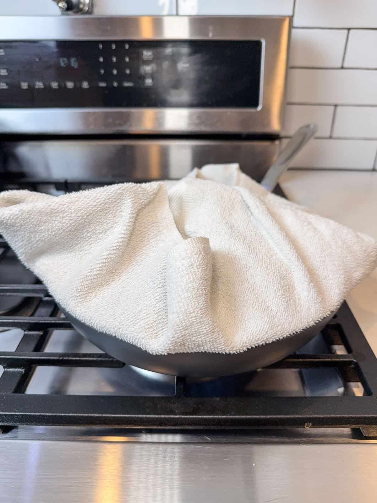 Wrap a clean kitchen towel around the lid of and place it on the skillet. This soaks up excess moisture and ensures a light and airy rice.