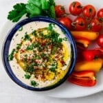 This easy and creamy tahini sauce is mixed with garlic, fresh lemon juice that is the perfect addition to drizzle over grilled meats and vegetables.
