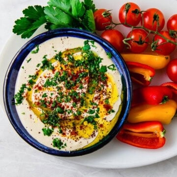 This easy and creamy tahini sauce is mixed with garlic, fresh lemon juice that is the perfect addition to drizzle over grilled meats and vegetables.