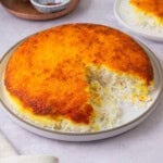 This crispy Persian rice is called tahdig and is made with fragrant basmati rice and has a layer of crispy rice that's flavored with saffron and turmeric.