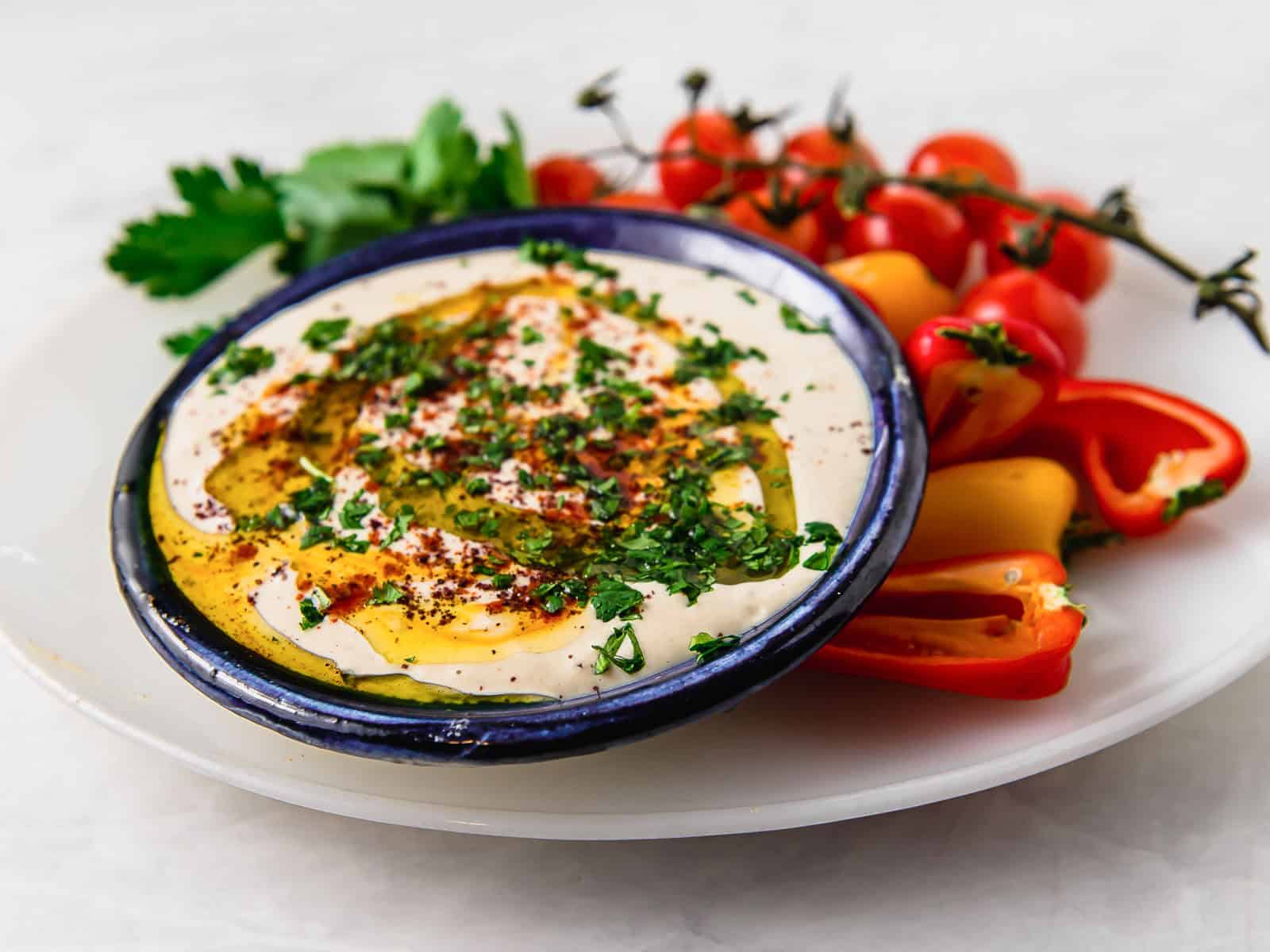 This creamy lemon tahini sauce is a Mediterranean staple! Drizzle over grilled meats, vegetables or use as a dip.