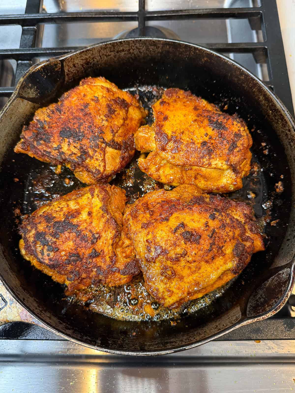 Sear the preserved lemon chicken until deeply golden on both sides.