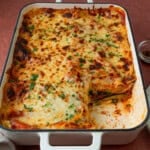 This lower-carb vegetarian zucchini lasagna is layered with lasagna sheets, zucchini slices, spinach and three cheeses.