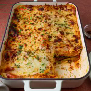 This lower-carb vegetarian zucchini lasagna is layered with lasagna sheets, zucchini slices, spinach and three cheeses.