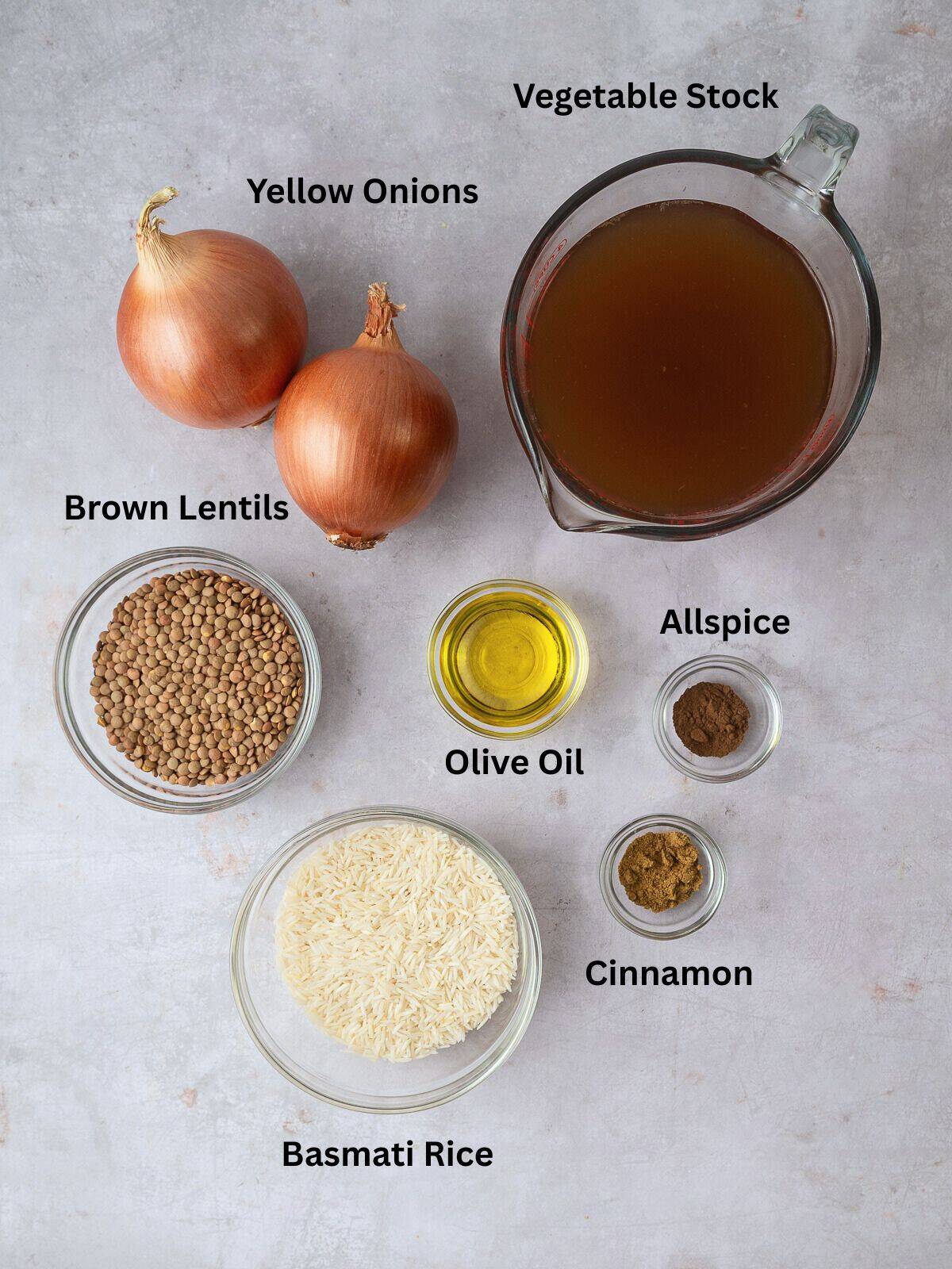 Simple ingredients for Lebanese mujadara include onions, rice, brown lentils, vegetale stock and spices.