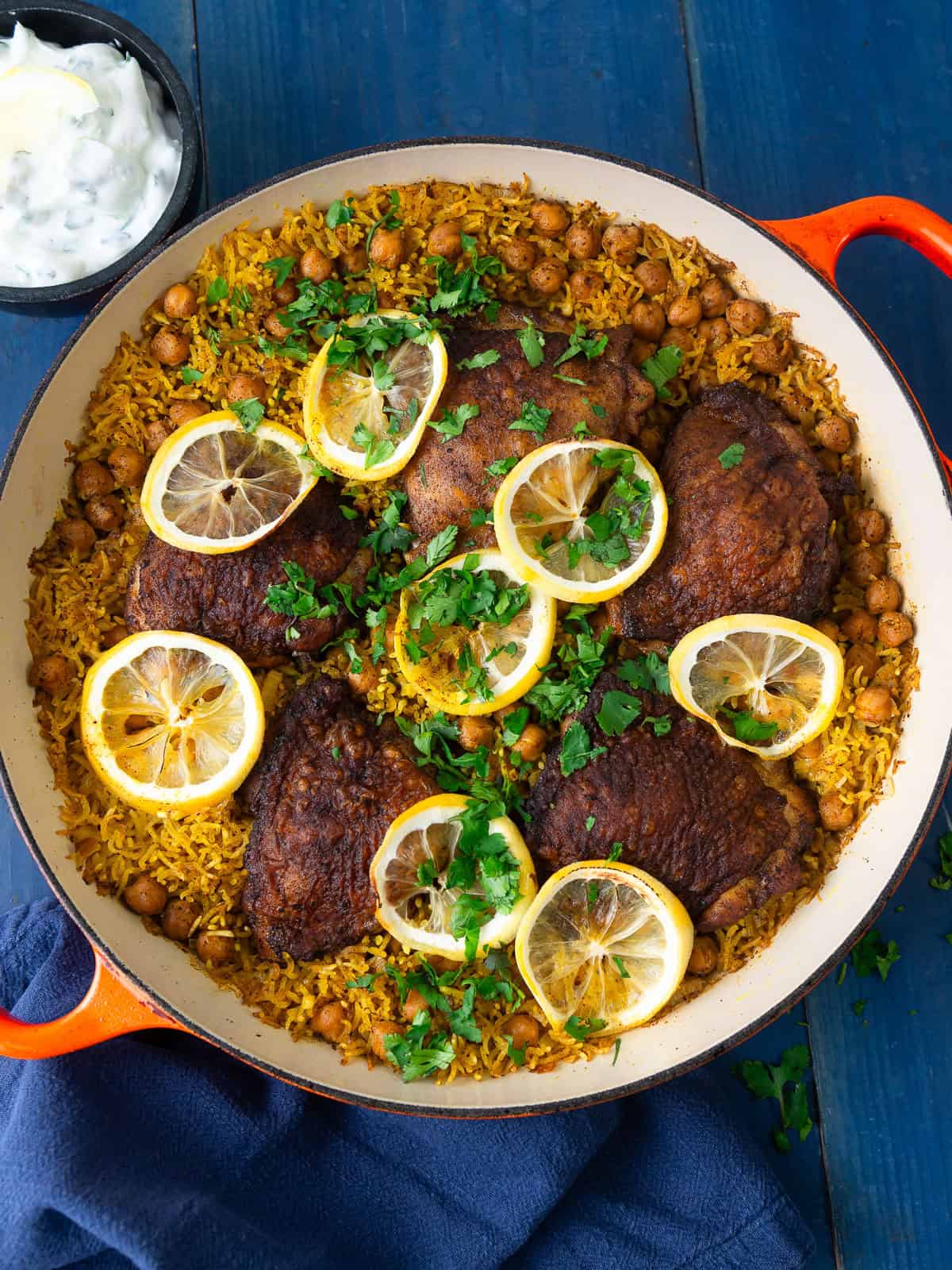 This one pot chicken and rice is layered with bold Mediterranean spices, chickpeas and fresh lemon.