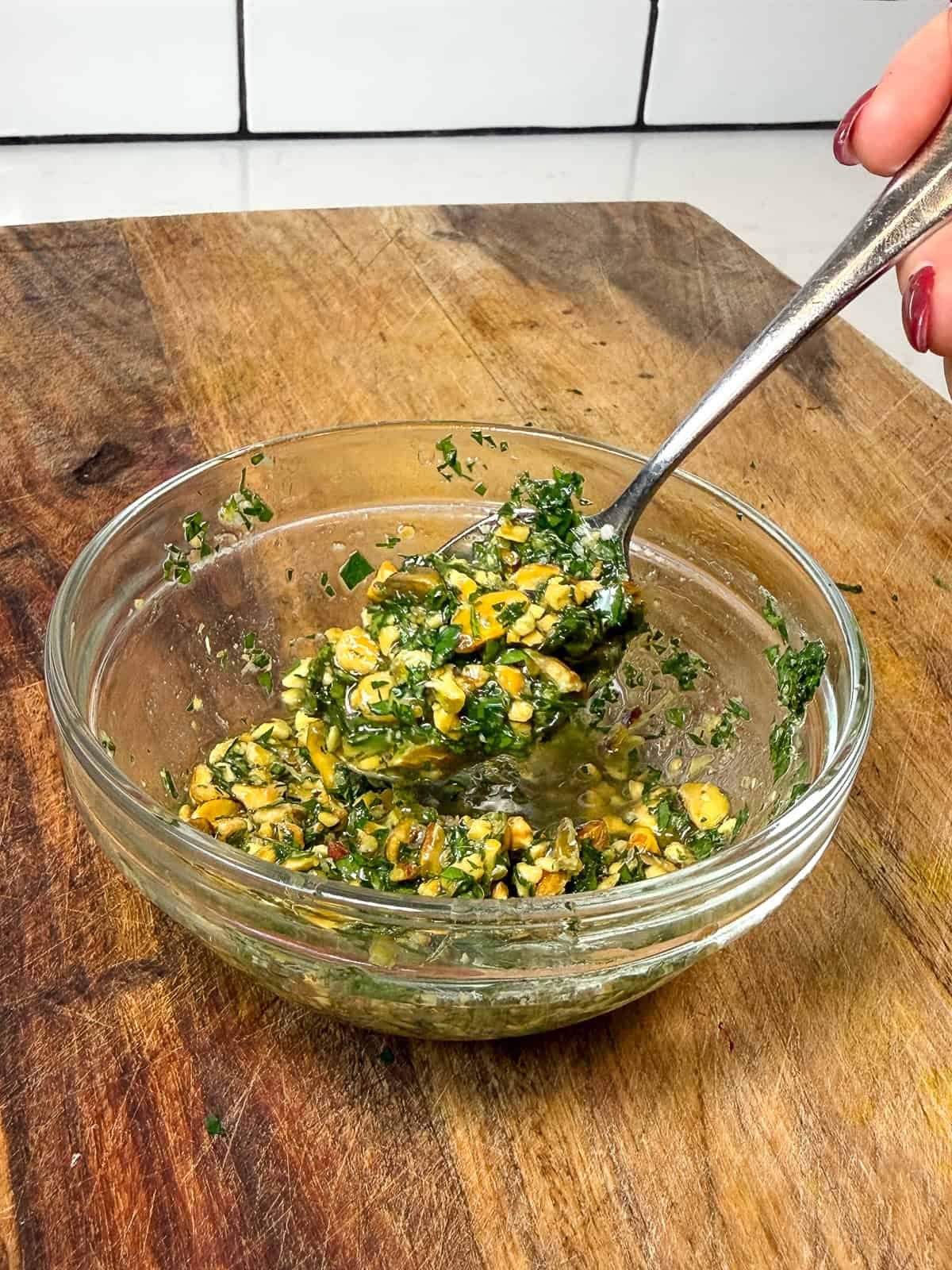 This pistachios gremolata is made simply with chopped pistachios, chopped parsley, lemon juice and olive oil.