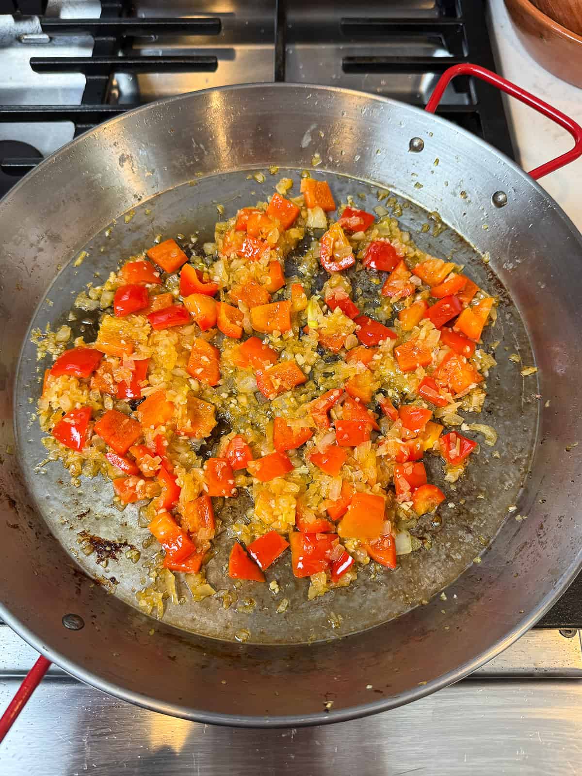 Saute the sofrito in the reserved chorizo fat.