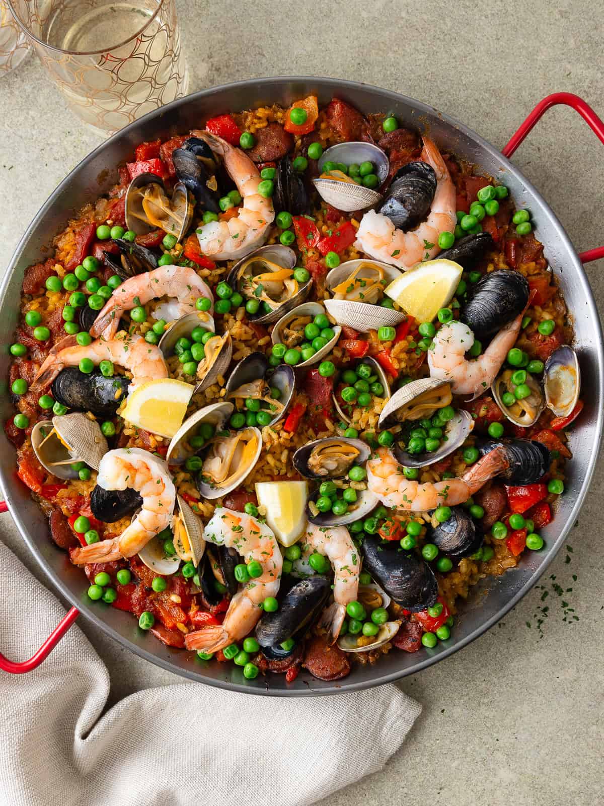 This shellfish and chorizo paella is full of mussels, clams, and shrimp in a robust smoky tomato broth.