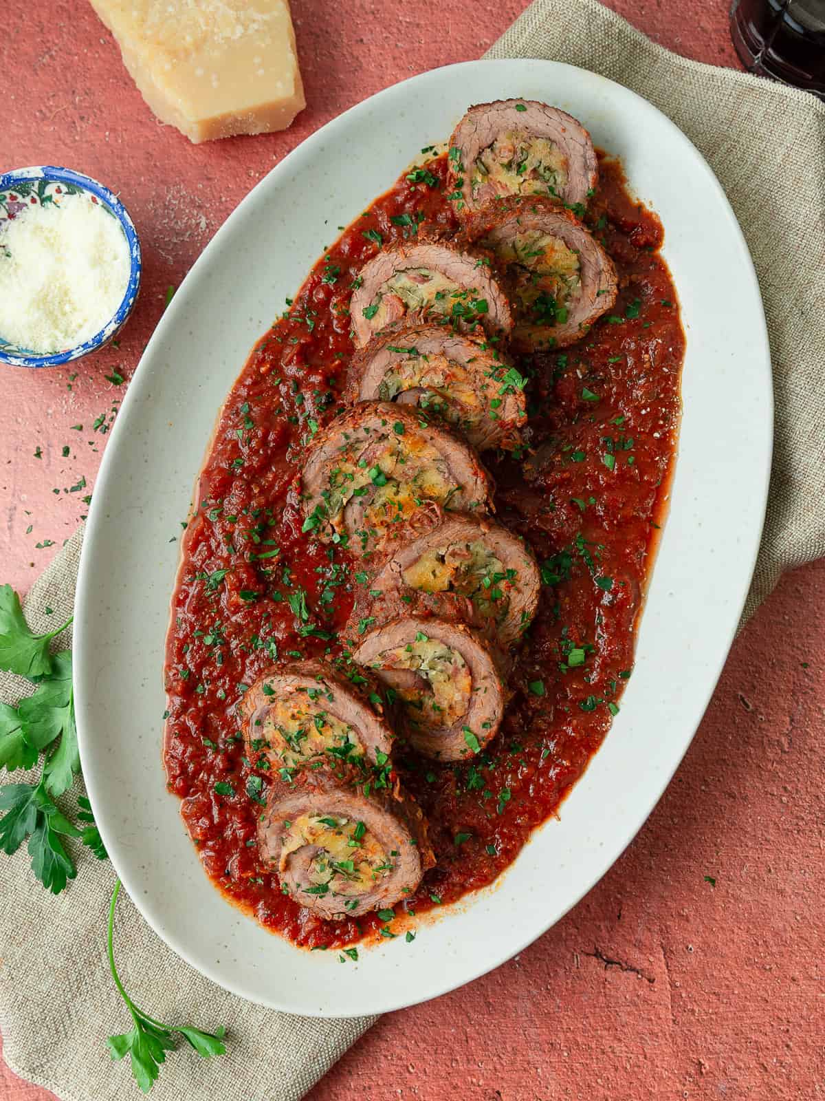 Braised beef braciole rolled with a savory mixture of prosciutto, parmesan, breadcrumbs and herbs.