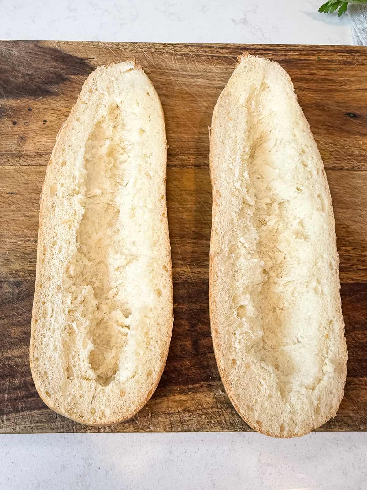Scoop out some of the bread from the inside of the baguette.