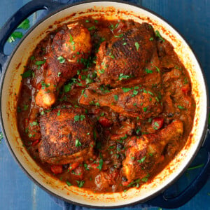 One pot sazon chicken is a bold weeknight dinner and layered with black beans, tomatoes and sofrito.