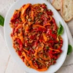 This Italian peperonata makes a great antipasti with sautéed peppers, onions and tomatoes that turn soft and jammy.