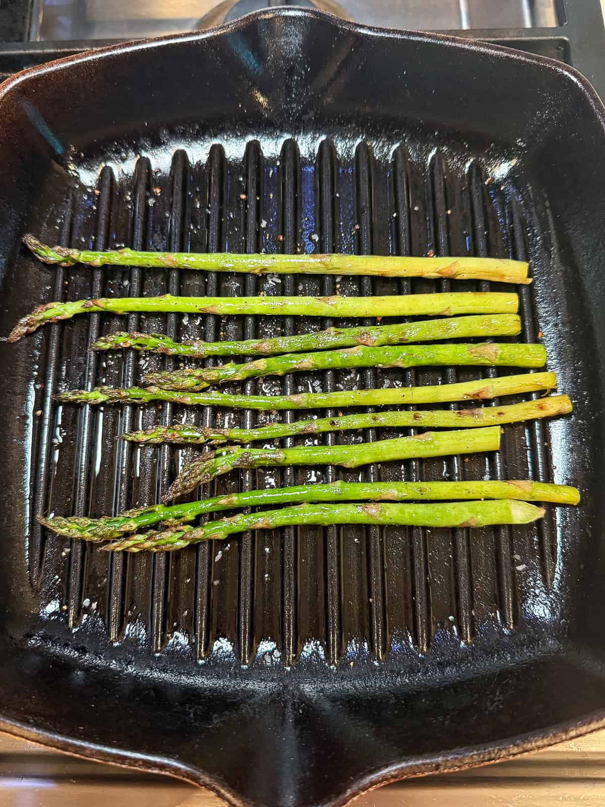 Grill the asparagus until just tender.