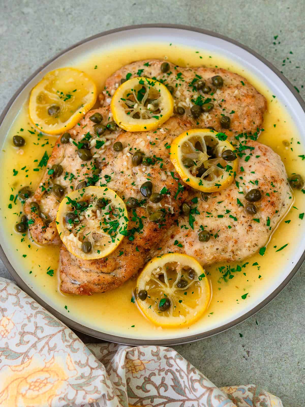 This classic chicken piccata recipe has tender chicken cutlets served with a buttery lemon caper sauce.