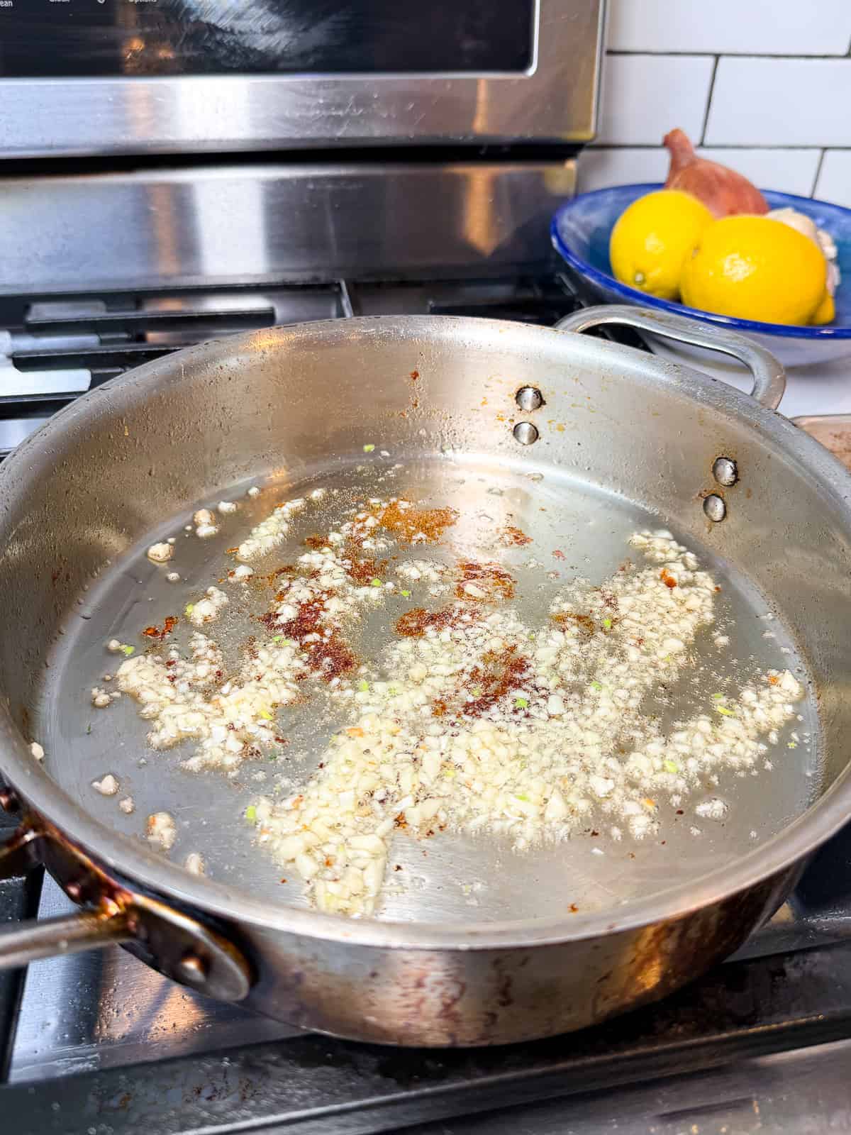 Saute the chopped garlic in olive oil until just fragrant.