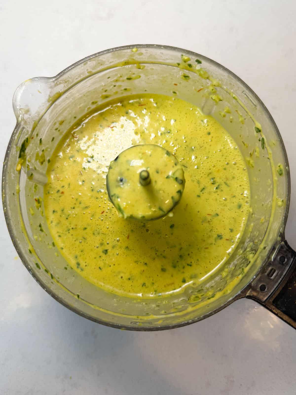 Blend the yogurt saffron marinade in a food processor until smooth.