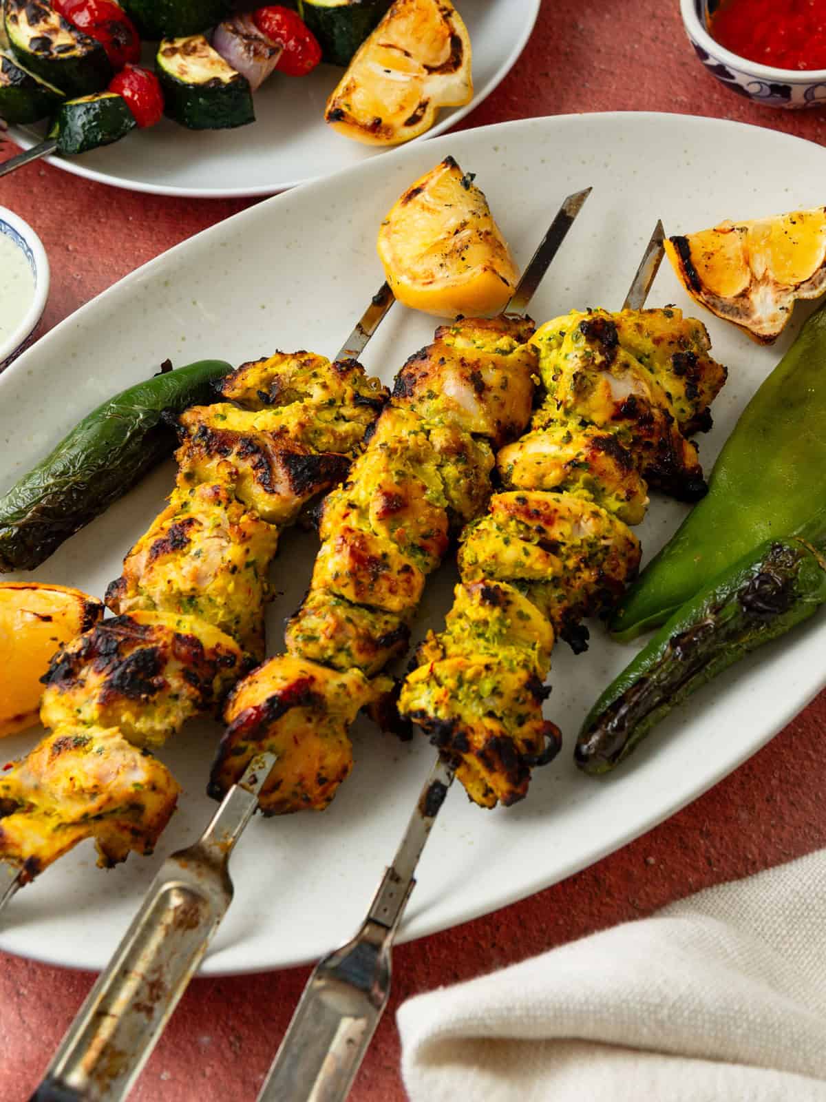 These saffron yogurt chicken skewers are perfectly grilled and full of bold Mediterranean flavors with spices and herbs.