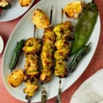 Saffron yogurt chicken skewers are full of flavor with spices and herbs.
