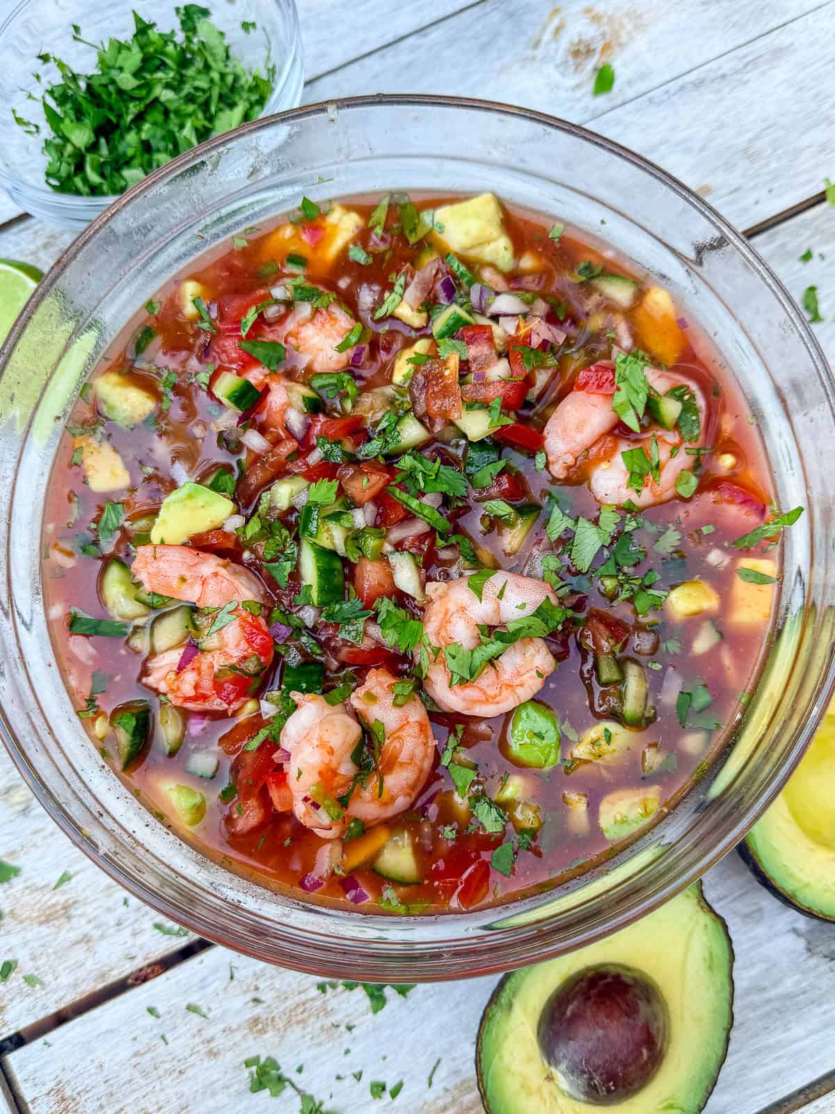 This easy Mexican shrimp cocktail is full of fresh shrimp, creamy avocado and a savory cocktail sauce made with clamato.