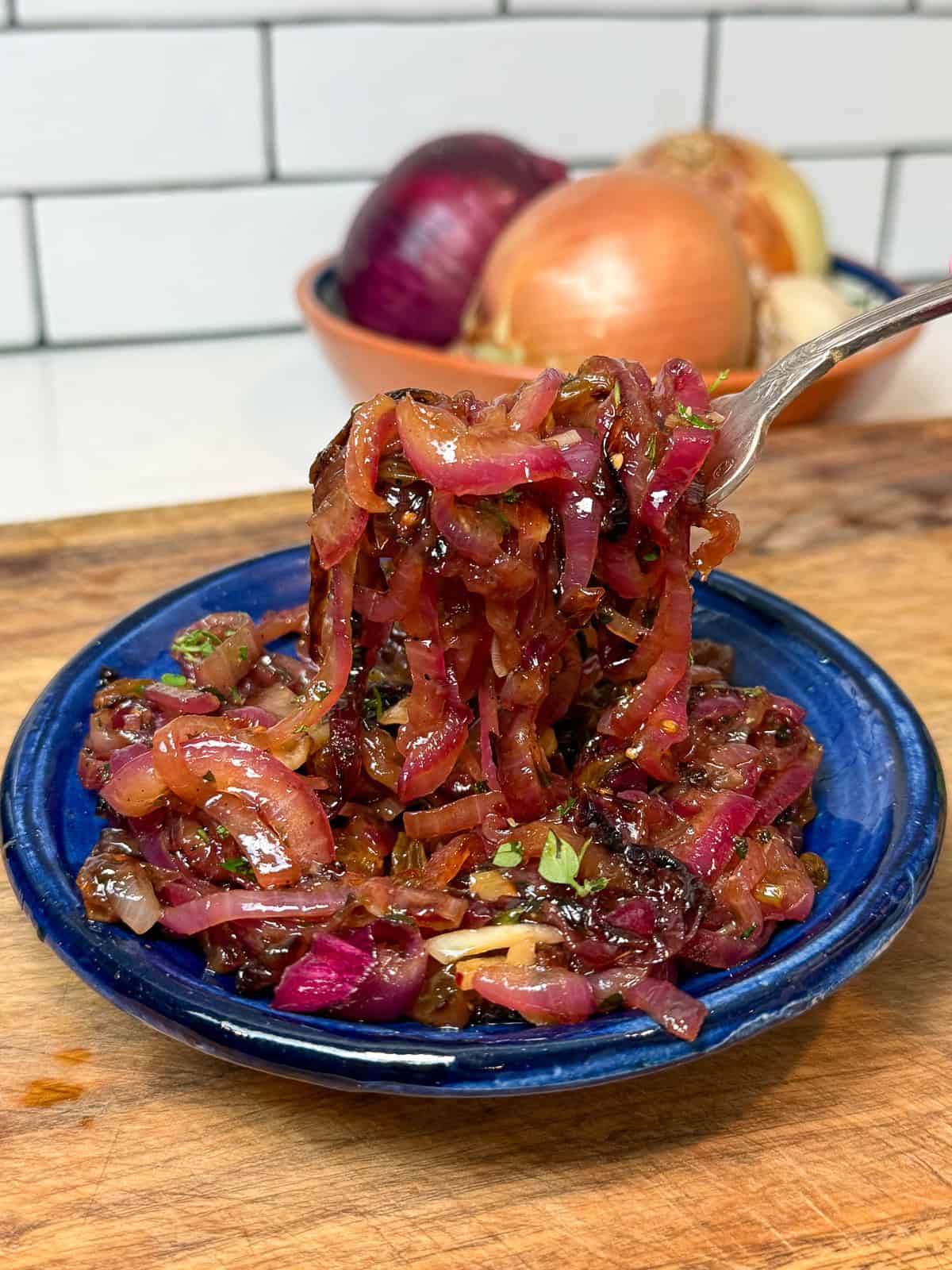 Caramelized onion agrodolce with golden raisins.