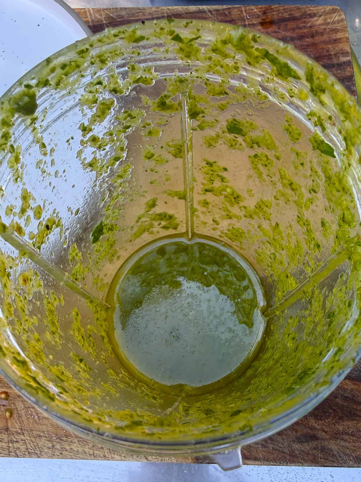 Add the fresh parsley, mint, shallot, olive oil, vinegar and honey to a blender and blend until you have a smooth herb vinaigrette.