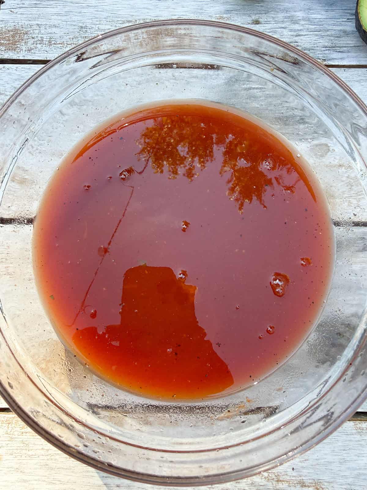 Make the cocktail sauce by combining clamato, ketchup, lime juice, lemon juice and hot sauce.