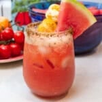 Watermelon and tomato agua fresca is lightly sweetened with agave, has fresh lime juice and is a refreshing drink for a warm day.