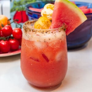 Watermelon and tomato agua fresca is lightly sweetened with agave, has fresh lime juice and is a refreshing drink for a warm day.