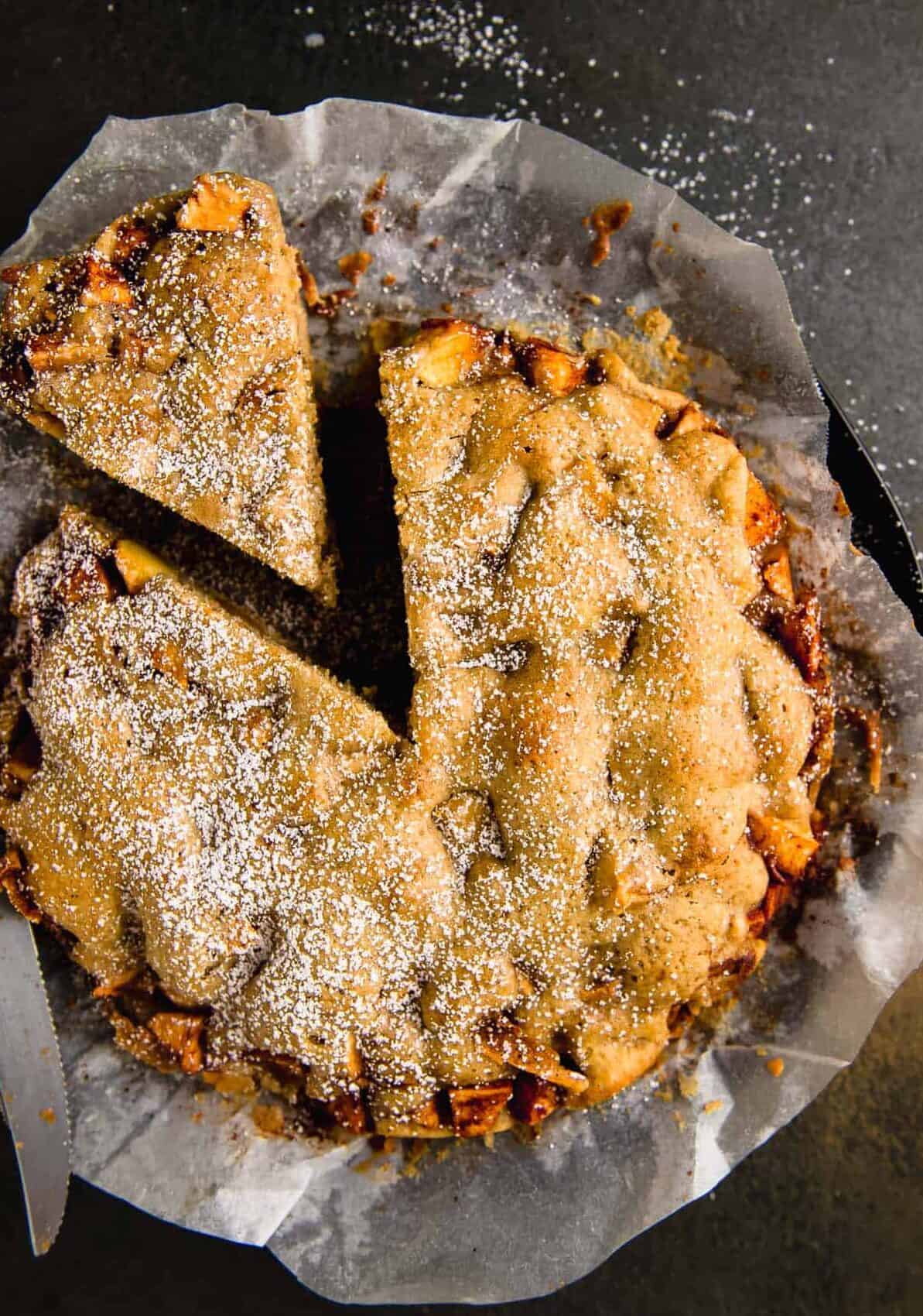 This easy apple cake is flavored with aromatic cardamom, bright orange zest and loaded with chunks of sweet apples.