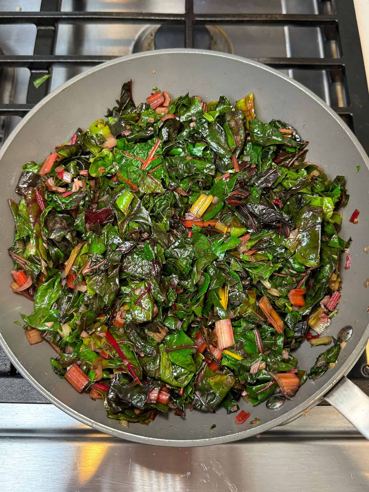 Saute the chopped shallot, garlic and chard stems, then add the chard leaves and saute until wilted.