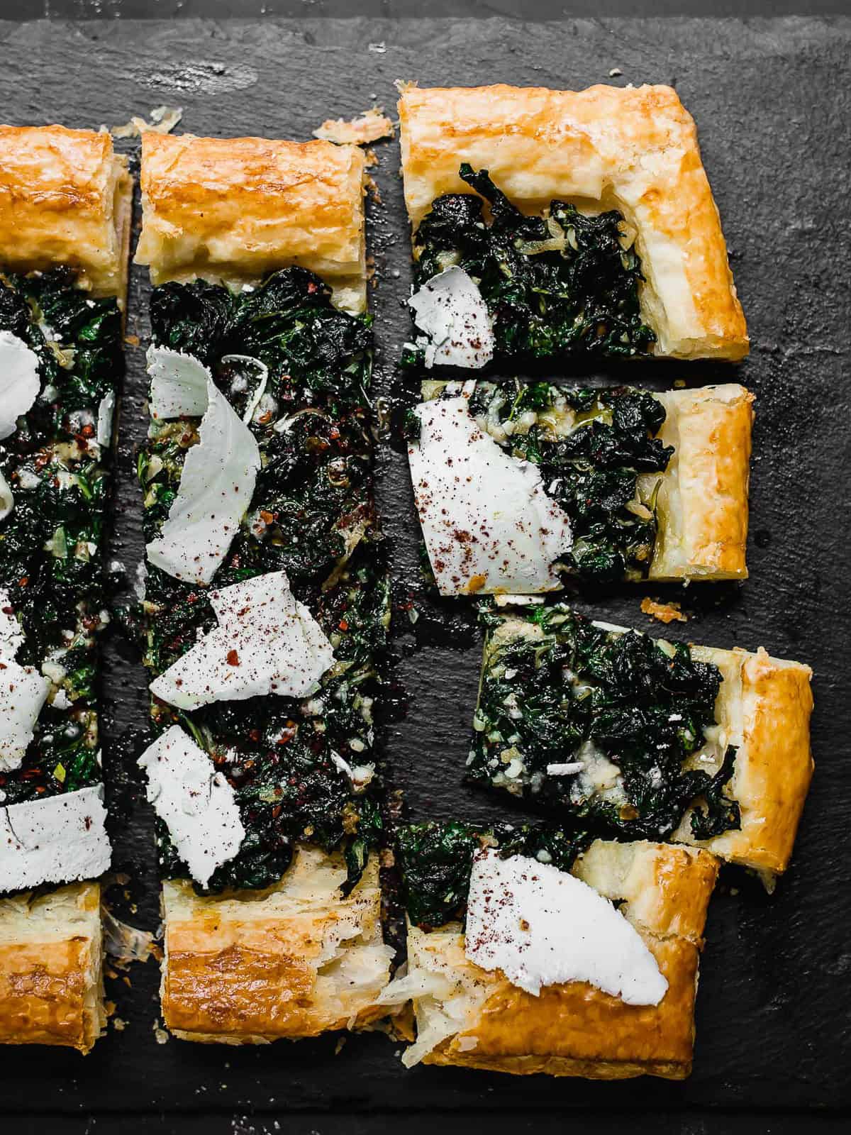 This savory chard tart is made with buttery puff pastry and finished with shaved ricotta salata and tangy sumac.
