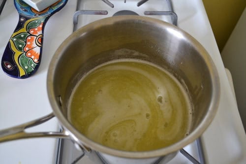 Melt butter for the bamieh (Persian donuts).