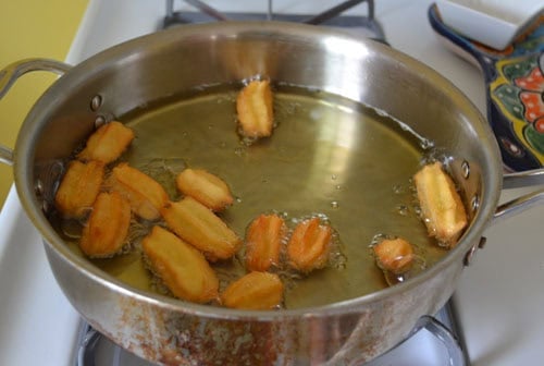 Fry the Persian donuts in hot oil until golden brown.