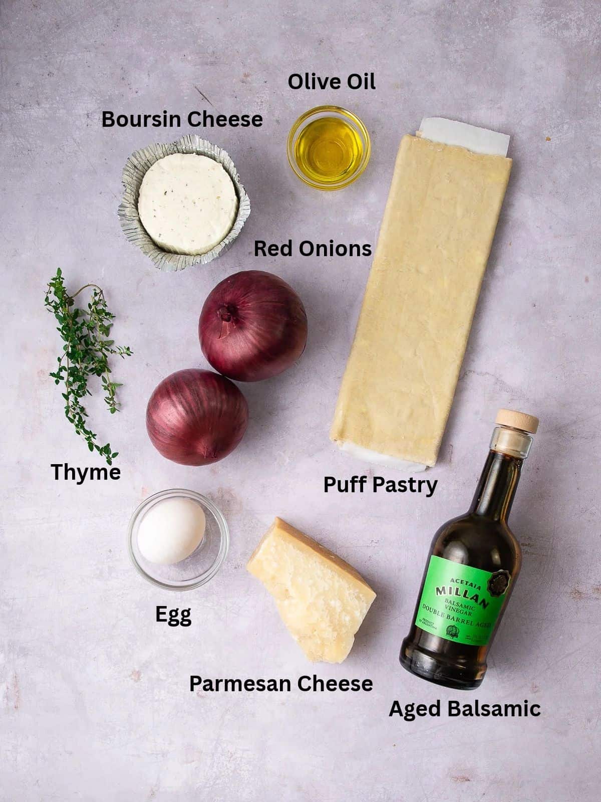 Ingredients for the onion tart include boursin cheese, thyme, parmesan cheese and aged balsamic.